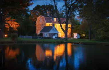 A historic stone building beside water in Horsham Township.